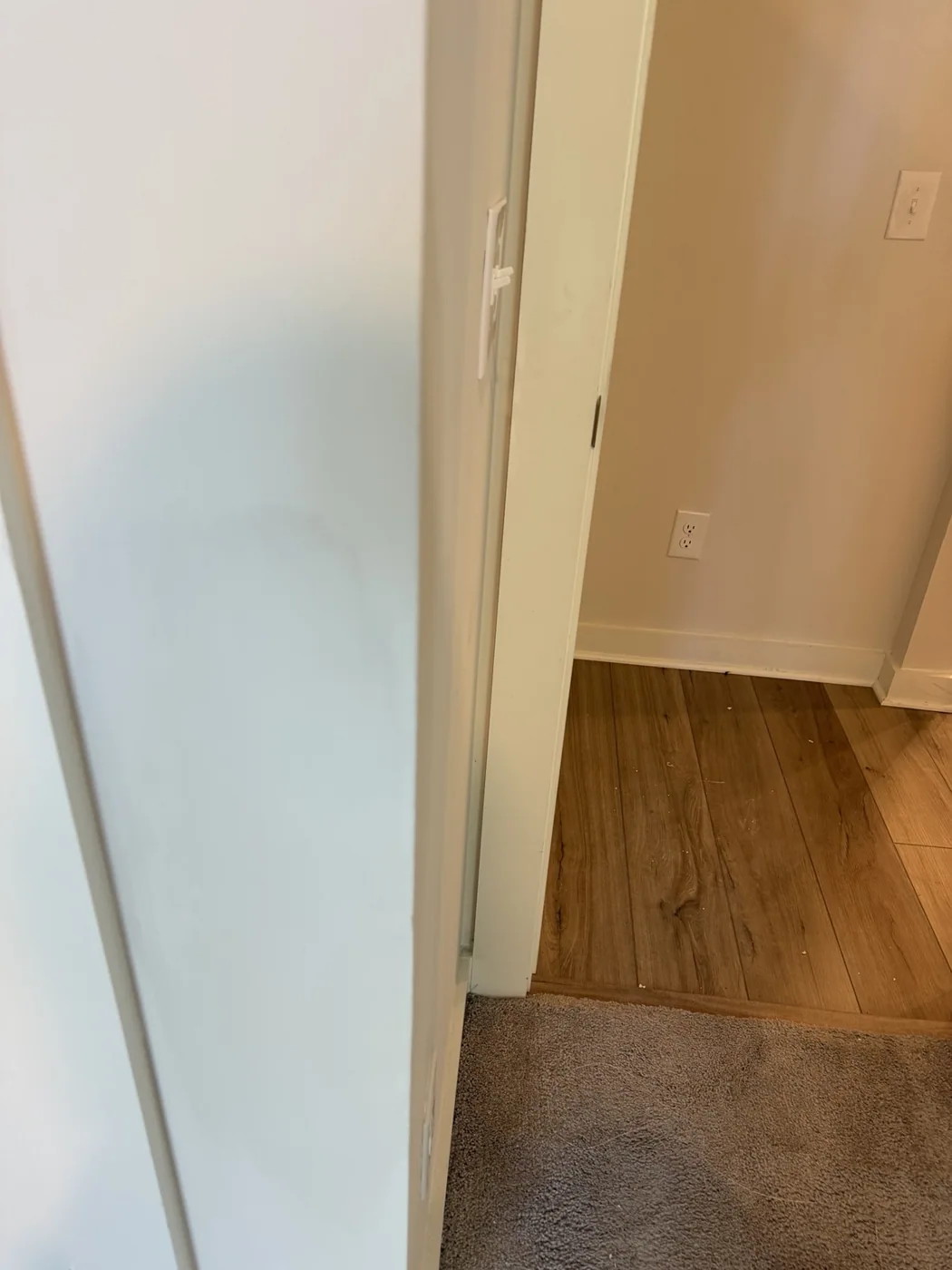Finished wall repair by doorway