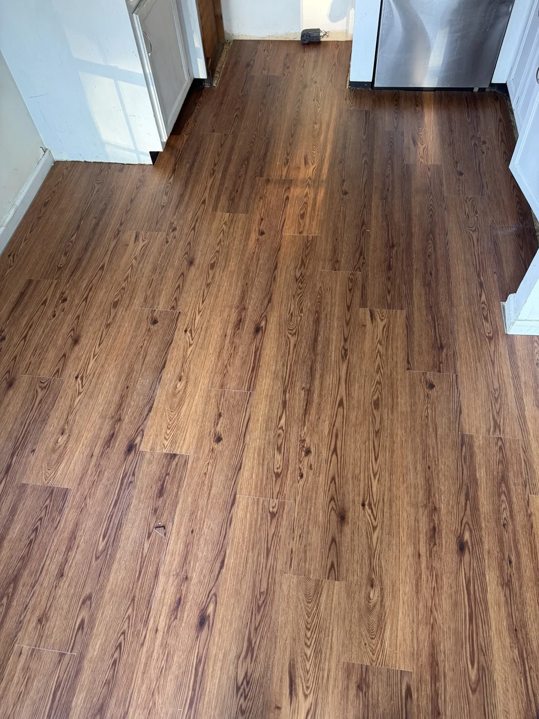 Wood-look flooring installed in kitchen