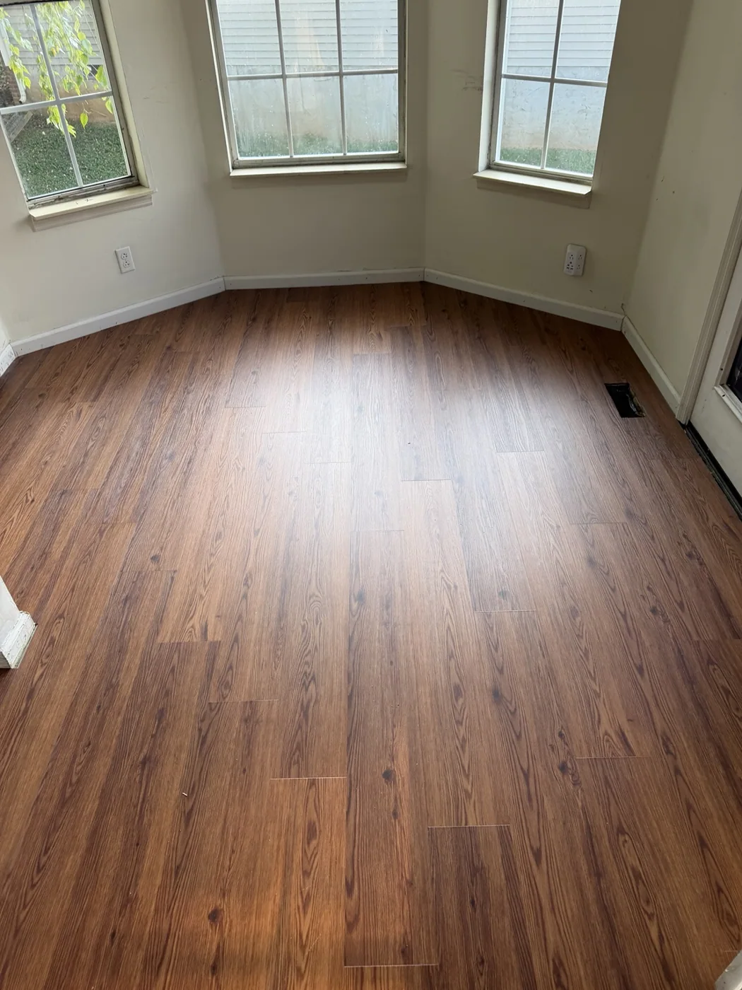 Wood-look flooring installed in dining nook