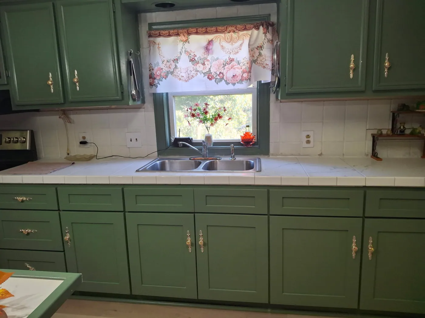 Existing green kitchen cabinets and older tile countertops