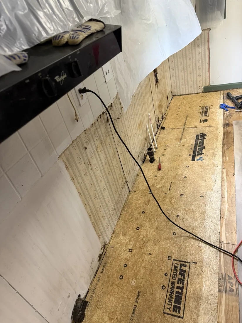 New kitchen subfloor panels installed during renovation